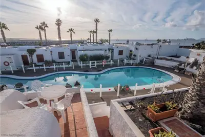 Image de Appartement \"Puerto Chico 7\" avec vue sur la mer, piscine partagée, terrasse et Wi-Fi