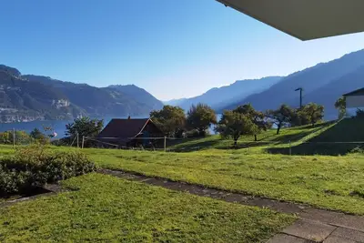 Panoramic room overlooking Lake Thun