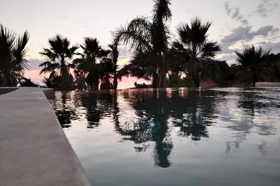 Image de Ancient sea and sunset view millstone with swimming pool