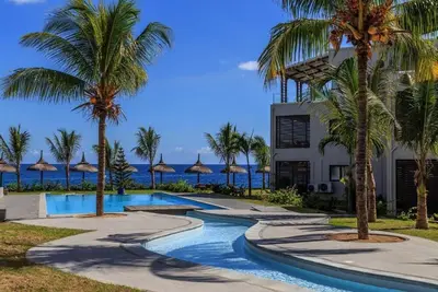 Image de Splendide apartment de 3cac en face de la mer Ă Flic en Flac