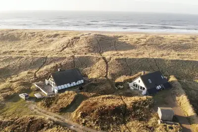 Image de Fantastic! House Bassekrej is situated in the dunes on the wide sandy beach.