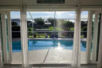 Image de 🦀 Waterfront house with dock & heated pool 🦀<br>1 mile from Siesta key 🌴