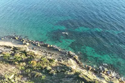 Image de Bellissima proprietĂ , soli 100mt dal castello Aragonese a 2 passi dalla spiaggia