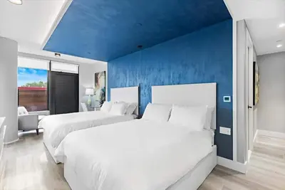 Image de Cozy Double Queen Suite w/ Kitchen | 4 mins away from Subway | Mott Haven
