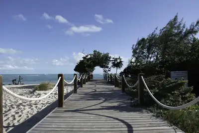 A Kiteboarders Dream complete with a Pickle Ball Court and a Pool! !