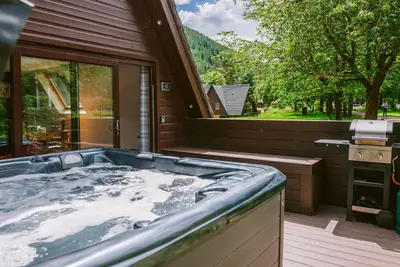 Image de Cabine-Salle de bain privée séparée-Vue sur Lac-Hot Tub