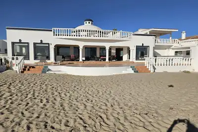 Beachfront book 4 bdrm. Or add Casita for 5 bdrms\nUpdated Private & Pet Friendly
