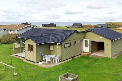 Image de Maison de vacances pour 4 a Løkken-By Traum