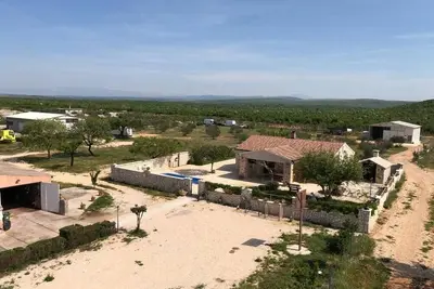 Image de Maison de vacances Budak pour 1 - 8 personnes avec 3 chambres à coucher - Maison de vacances