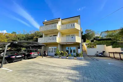 Image de Appartement de vacances avec climatisation, chauffage, accès internet et machine à laver