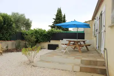 Image de Ambiance familiale pour cette maison avec jardin, de plain-pied et lumineuse.