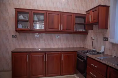 Private room in a villa - located in Sinza