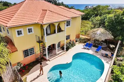 Large Private Pool - 1 minute walk to beach Ac in All bedrooms! ! !