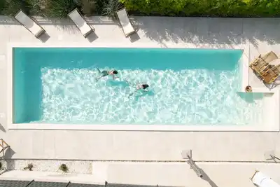 Image de 80m2 of luxury, design and comfort. Enjoy in a large garden area & heated pool