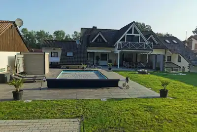 Image de Apartment / attic apartment with balcony, pool, terrace, barbecue and garden.