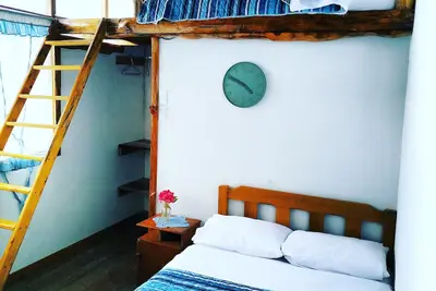 Image de HabitaciĂłn familiar con balcon privado alejado del bullicio de la ciudad