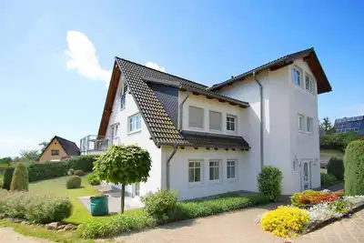 Image de Balcony with wonderful sea view, use of swimming pool and sauna - Dünenhaus FeWo05