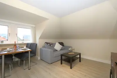 Image de Haus Sarah 7 is located directly on the beach in the heart of Westerland. <br>The beach crossing to Westerland's central beach is about 200 meters away. <br>The house has 8 modern and comfortably furnished vacation apartments for.