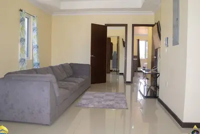 Image de Located centrally in New Kingston, walking distance from exciting activities.