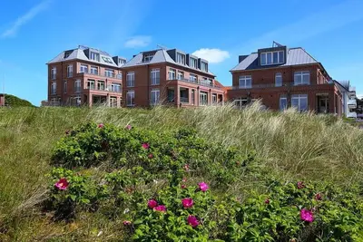 Image de Great family vacation apartment with sunny south-facing terrace - only 100 m to the beach! -