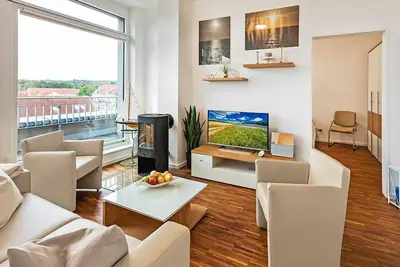 Image de Great penthouse apartment with roof terrace and wood-burning stove - only 150 m to the beach!