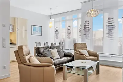 Image de Great penthouse with roof terrace and sea view, beach chair, fireplace and sauna! -