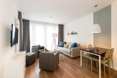 Image de Great vacation apartment with balcony incl. use of swimming pool & sauna near the beach