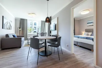 Image de Chic, modern vacation apartment with loggia and use of the Spa included -