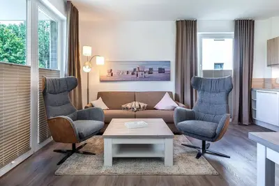 Image de Lovely vacation apartment with terrace and view of the greenery, sauna area included