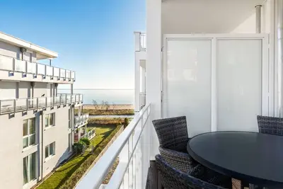 Image de Light-flooded apartment on the Baltic Sea with balcony and sauna area in the house - apartment complex