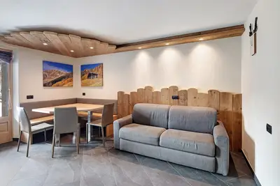 Image de Appartement \"Rasia Residence Relax\" avec vue sur la montagne, jardin partagé et Wi-Fi