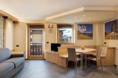 Image de Appartement \"Rasia Residence Relax\" avec vue sur la montagne, jardin partagé et Wi-Fi