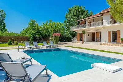Sophisticated Villa with A\/C, Extensive Gardens, Private Pool, Close to Beautiful Sandy Beaches