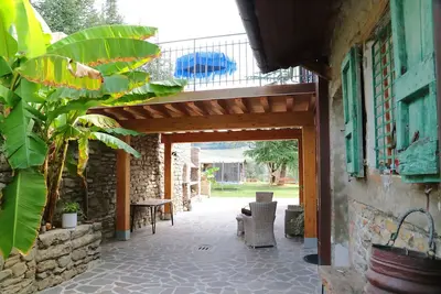 Image de Maison de vacances \"Re Piano appartamento Le Rondini\" avec vue sur le lac, sauna et Wi-Fi
