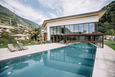 Image de Appartement de vacances 'Camping Passeier Alpenrose' avec sauna, vue sur la montagne, jardin et Wi-Fi