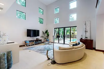 Image de Luxe home with two balconies, resort-style pool, & fenced yard - near the beach