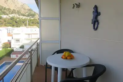 Image de Appartement Miami Ii 307, vue montagne, piscine, Wi-Fi et jardin.