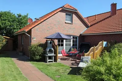 Image de Nordlicht - Holiday home (100sqm) for 6 people with fireplace and garden in a central location.