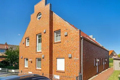 Image de Frieso am Siel - High-quality vacation apartment (70sqm) with fireplace, balcony for 4