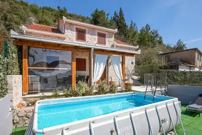 Image de Superbe maison à Mliniste avec WiFi