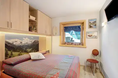 Image de Baita del Sole - Appartement 3, vue montagnes, Wi-Fi, terrasse & jardin