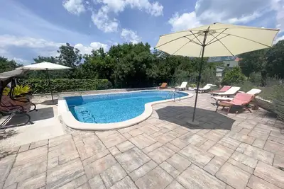 Image de Appartement de vacances avec balcon et piscine