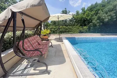 Image de Appartement de vacances avec vue et piscine