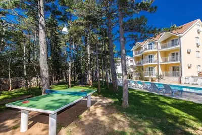 Appartement de vacances avec piscine partagée