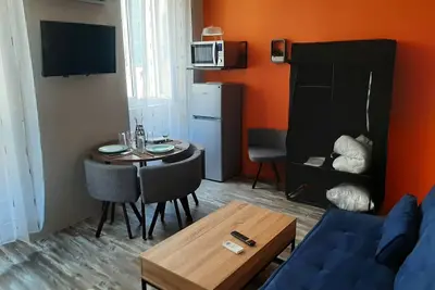 Image de \" Les Iris \" Apt 106, T2 Cosy, 30 m2, 1 chambre avec Tv