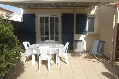 Image de Pretty little house 100m from the beach and shops, with Wifi connection