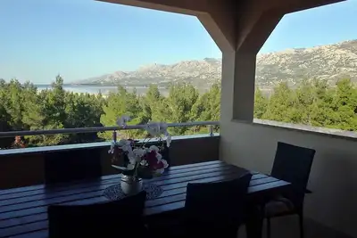 Image de Appartement de vacances avec climatisation et vue sur la mer