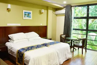 Image de Blue Wave Guest House includes a garden & a patio & is located in Kudahuvadhoo.
