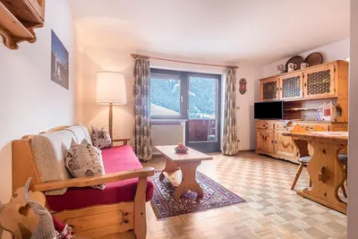 Image de Appartement \"Casa Rustica Seceda\" près de la remonte-pente avec vue montagne et jardin