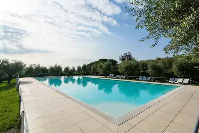 Image de Manoir au lac de Garde avec piscines